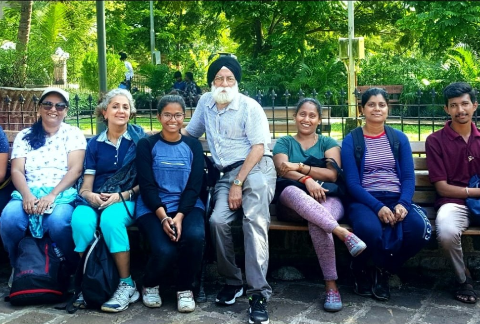 People on a green city trail to Sion Fort posing for a photo